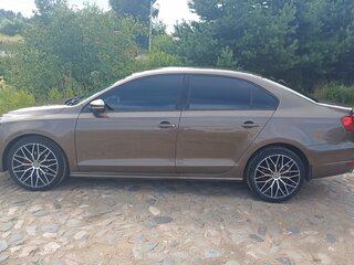 2011 Volkswagen Jetta VI, коричневый, 820000 рублей, вид 1