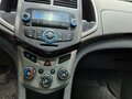 2012 Chevrolet Aveo II, серебристый, 255000 рублей - вид 7