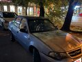 2012 Daewoo Nexia I Рестайлинг, серый, 99000 рублей - вид 1