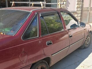 2004 Daewoo Nexia I, красный, 70000 рублей, вид 2
