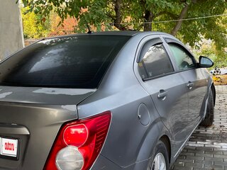 2012 Chevrolet Aveo II, серебристый, 280000 рублей, вид 2