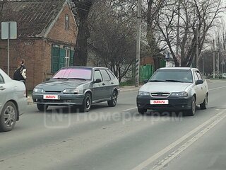 2012 Daewoo Nexia I Рестайлинг, серебристый, 230000 рублей, вид 2