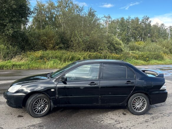 2009 Mitsubishi Lancer Classic IX Рестайлинг, чёрный, 330000 рублей - вид 9