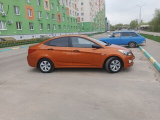 2014 Hyundai Solaris I Рестайлинг, оранжевый, 930000 рублей, вид 3