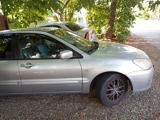 2005 Mitsubishi Lancer IX, серебристый, 550000 рублей, вид 3