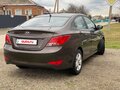 2014 Hyundai Solaris I Рестайлинг, коричневый, 1150000 рублей - вид 4