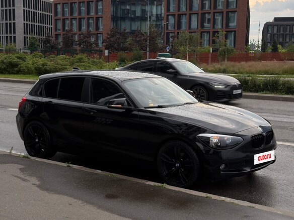 2012 BMW 1 серии 116i II (F20/F21), чёрный - вид 1