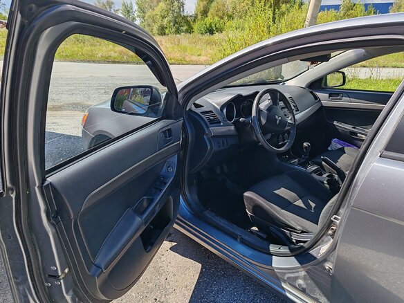 2012 Mitsubishi Lancer X Рестайлинг, серый - вид 2