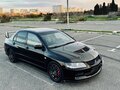 2006 Mitsubishi Lancer Evolution IX, чёрный, 5500000 рублей