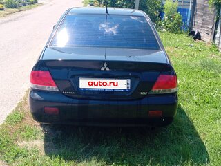 2006 Mitsubishi Lancer IX Рестайлинг, чёрный, 320000 рублей, вид 2