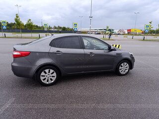 2014 Kia Rio 6-speed III, серый, 985000 рублей, вид 3