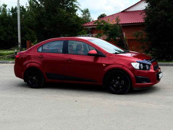2012 Chevrolet Aveo II, красный, 730000 рублей - вид 5