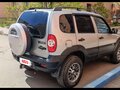 2015 Chevrolet Niva I Рестайлинг, серебристый, 570000 рублей - вид 1
