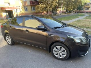 2014 Kia Rio III, коричневый, 850000 рублей, вид 2