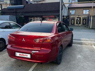 2008 Mitsubishi Lancer X, красный, 600000 рублей, вид 4