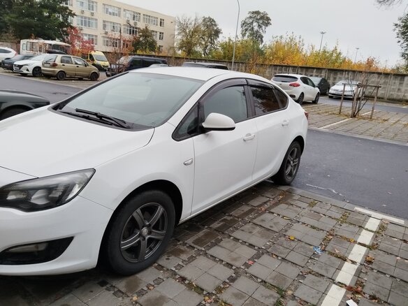 2014 Opel Astra J Рестайлинг, белый, 790000 рублей - вид 3
