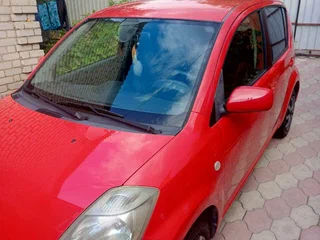 2008 Daihatsu Sirion II (M3) Рестайлинг, красный, 550000 рублей, вид 4