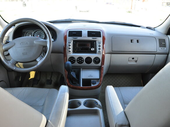 2004 Kia Carnival I Рестайлинг, зелёный, 380000 рублей - вид 5
