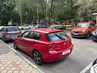 2012 BMW 1 серии 118i II (F20/F21), красный, 1800000 рублей, вид 5