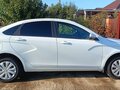 2024 Lada (ВАЗ) Vesta I Рестайлинг (NG), белый, 1300000 рублей - вид 2