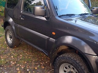 2011 Suzuki Jimny III Рестайлинг 1, чёрный, 1400000 рублей, вид 5