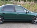 1996 Ford Mondeo II, зелёный - вид 3