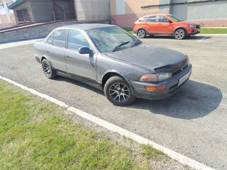 1991 Toyota Sprinter VII (E100), серебристый, 190000 рублей, вид 4
