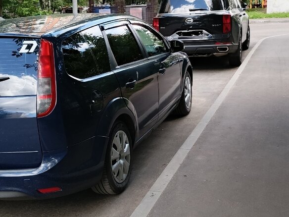 2010 Ford Focus II Рестайлинг, синий - вид 9