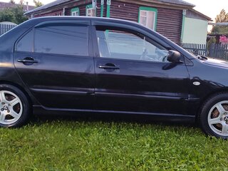 2006 Mitsubishi Lancer IX Рестайлинг, чёрный, 450000 рублей, вид 2