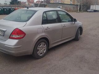 2012 Nissan Tiida I Рестайлинг, серебристый, 610000 рублей, вид 1