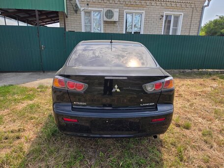 2010 Mitsubishi Lancer X, чёрный, 438000 рублей, вид 3