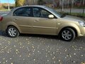2011 Kia Rio II Рестайлинг, бежевый, 649000 рублей - вид 1