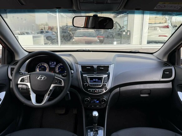 2014 Hyundai Solaris I Рестайлинг, оранжевый, 780000 рублей - вид 6