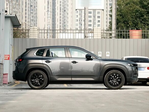 2026 Mazda CX-50, чёрный - вид 3