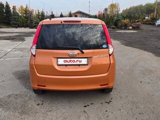 2009 Daihatsu Boon Luminas, оранжевый, 750000 рублей, вид 3