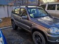2013 Chevrolet Niva I Рестайлинг, серый, 600000 рублей - вид 2