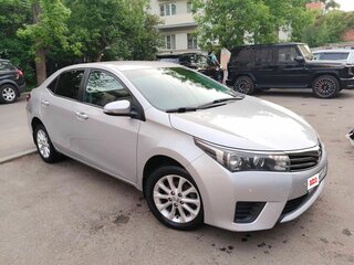 2014 Toyota Corolla XI (E160, E170, E180), серебристый, 1449000 рублей, вид 2
