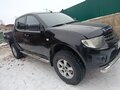 2013 Mitsubishi L200 IV, чёрный, 1650000 рублей