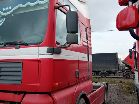 2003 MAN TGA, красный, 1430000 рублей - вид 5