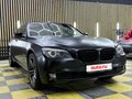 2011 BMW 7 серии Long 730Ld V (F01/F02/F04), чёрный, 1800000 рублей - вид 2