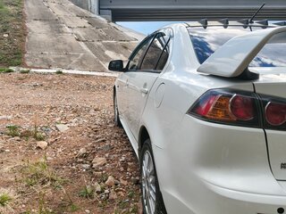 2011 Mitsubishi Lancer X Рестайлинг, белый, 640000 рублей, вид 4