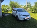 2011 Nissan Note I Рестайлинг, белый, 700000 рублей - вид 1