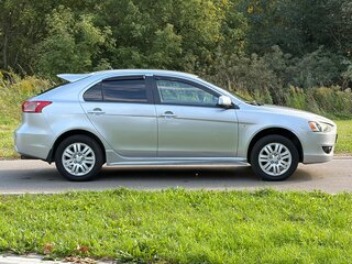 2010 Mitsubishi Lancer X, серебристый, 629000 рублей, вид 4