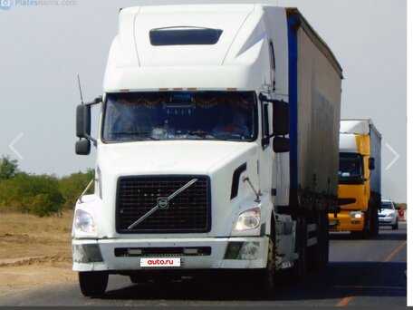 2004 Volvo VNL, белый, 3200000 рублей, вид 1