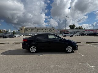 2013 Kia Rio 4-speed III, чёрный, 949000 рублей, вид 3