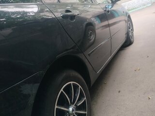 2004 Toyota Corolla Fielder IX (E120, E130) Рестайлинг, чёрный, 750000 рублей, вид 4