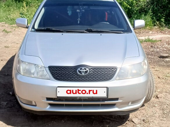2001 Toyota Corolla IX (E120, E130), серебристый - вид 2