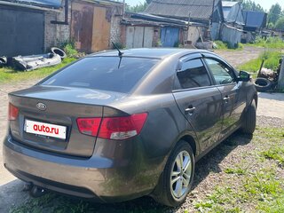 2009 Kia Cerato 5-speed II, коричневый, 550000 рублей, вид 2