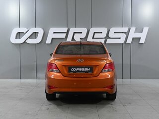 2015 Hyundai Solaris I Рестайлинг, оранжевый, 899000 рублей, вид 4