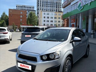 2012 Chevrolet Aveo II, серебристый, 620000 рублей, вид 1
